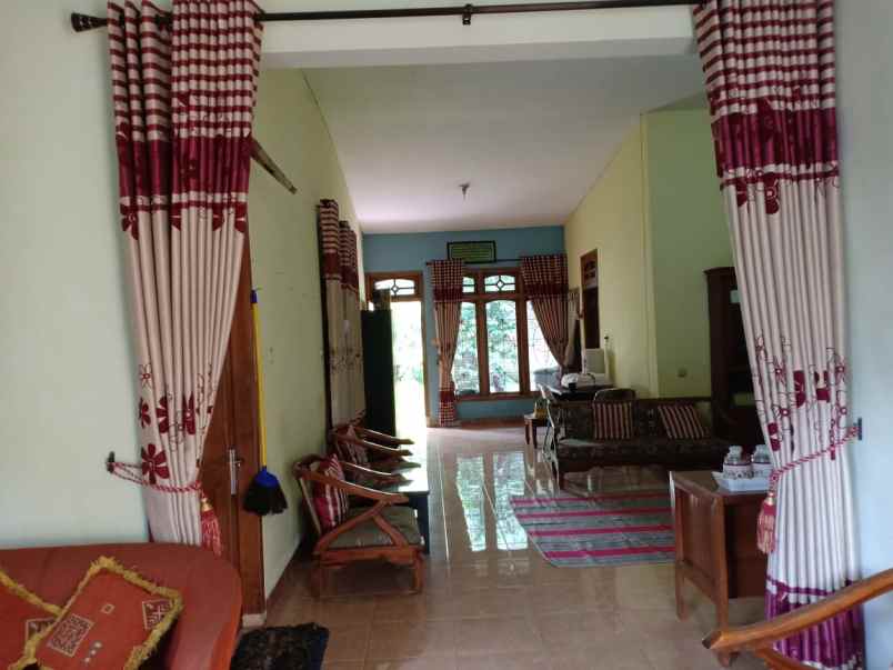 dijual rumah jalan teluk manado