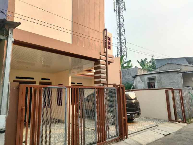 dijual rumah jl h saniin