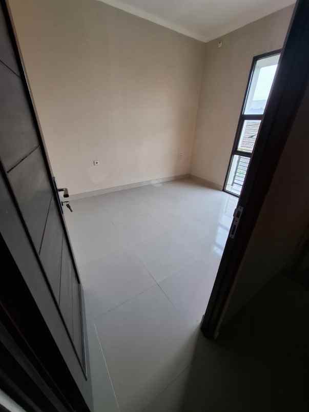 dijual rumah jl haji genang belakang