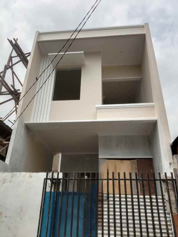 dijual rumah jl selat duren sawit