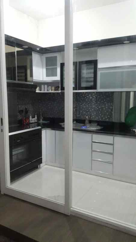 dijual rumah pakuwon city long beach