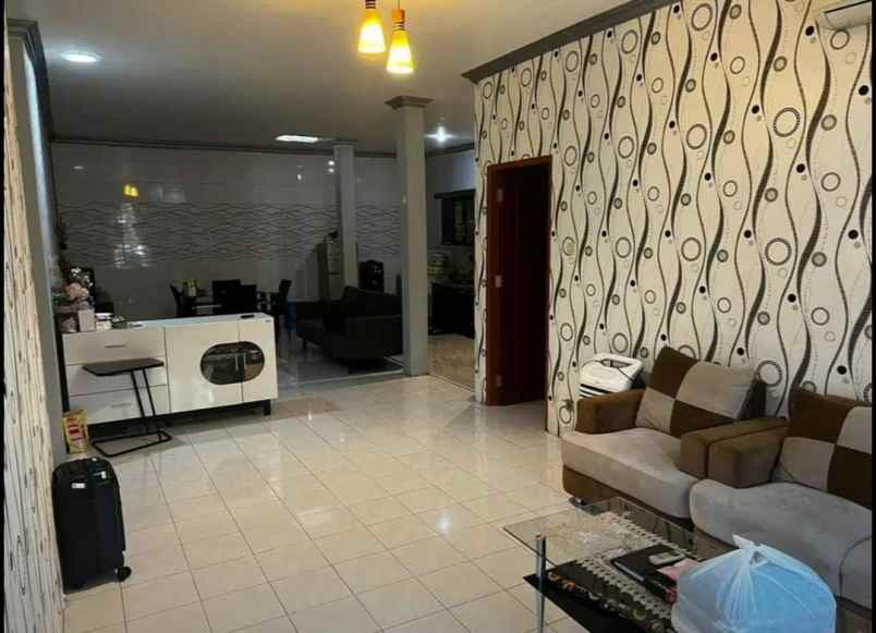 dijual rumah puri surya jaya taman pasadena