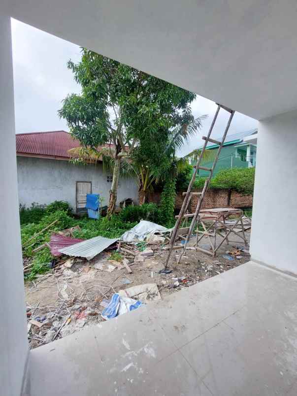 rumah modern asri di jalan darma bakti pekanbaru