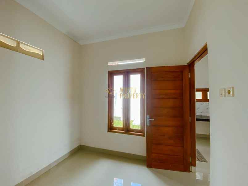 rumah siap huni dengan rooftop dekat gkj tulung