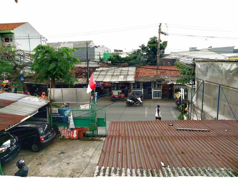 tanah dan bangunan di jalan utama kalideres