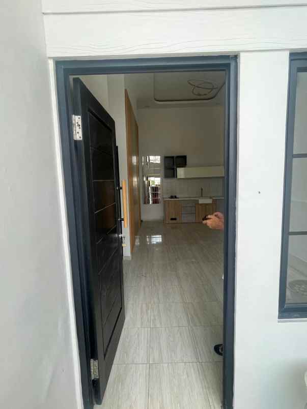 dijual rumah di perumahan grand residence city