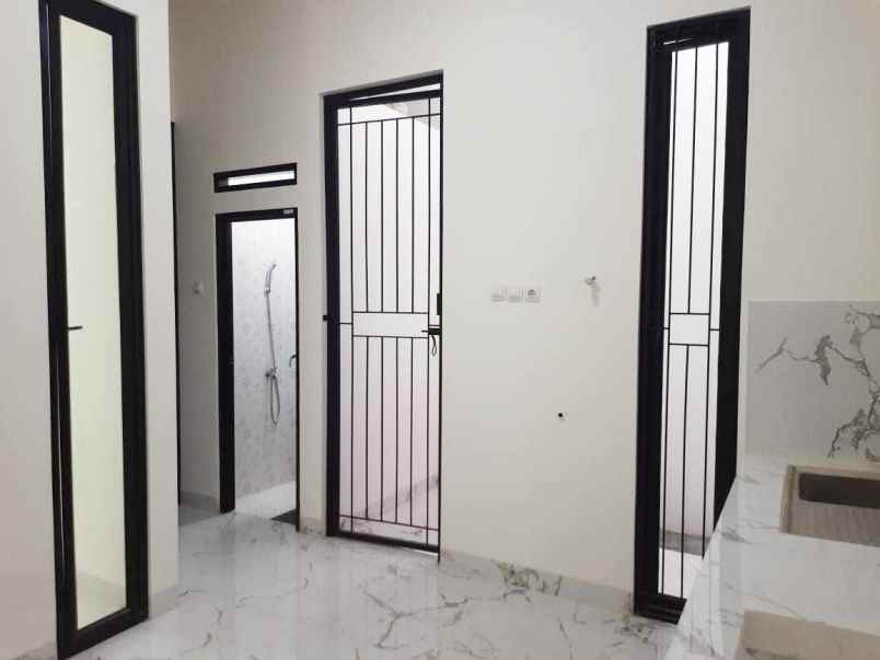 dijual rumah jalan caringin 4