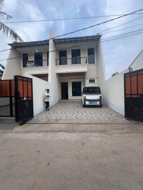 dijual rumah jl raya kodau jatikramat