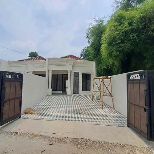 dijual rumah jln raya tole iskandar