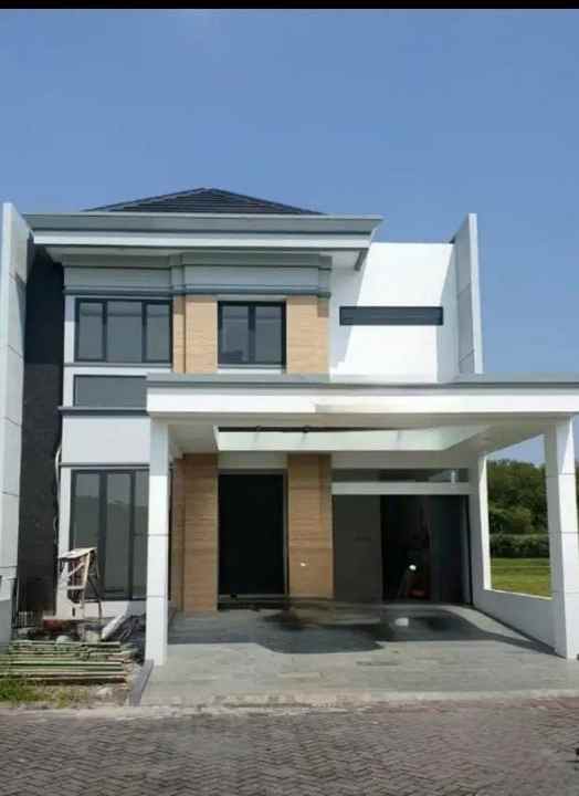 dijual rumah pakuwon city grand island