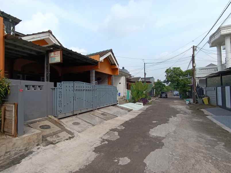 dijual rumah perumahan kalibaru permai