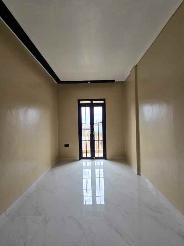 rumah baru non cluster plus rooftop di cipinang jaktim