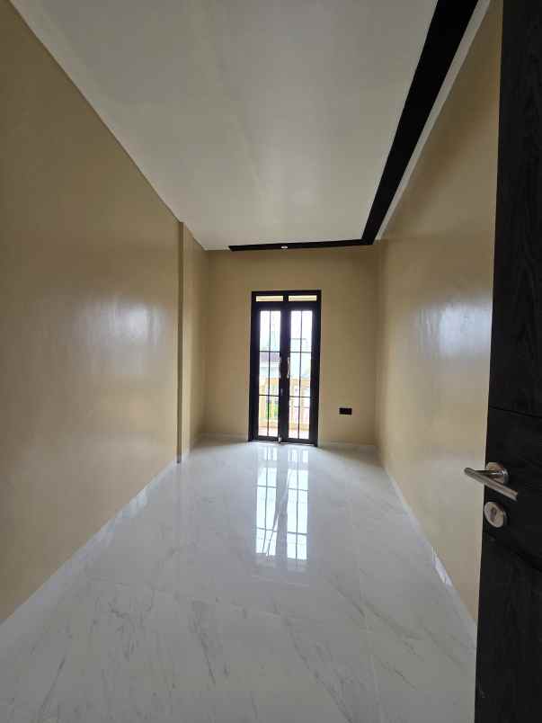 rumah baru non cluster plus rooftop di cipinang jaktim