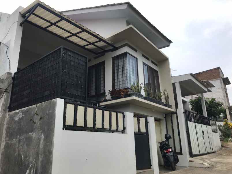 rumah minimalis cipageran bangunan baru siap huni