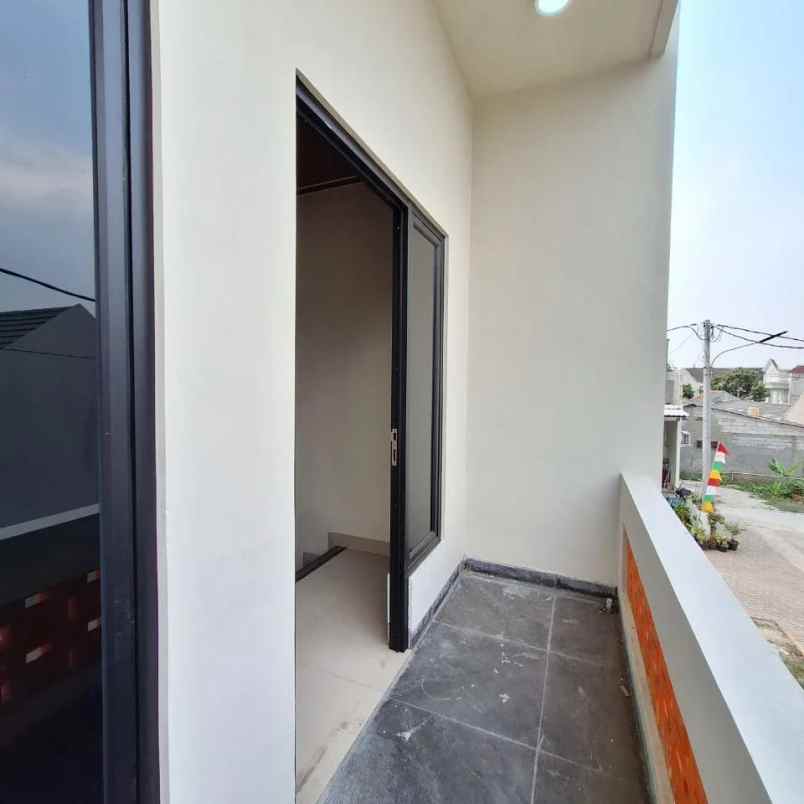 rumah modern 2 lt murmer dekat graha raya bintaro