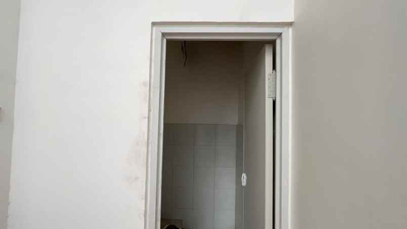 rumah nirwana eksekutif dekan merr gate tol superindo