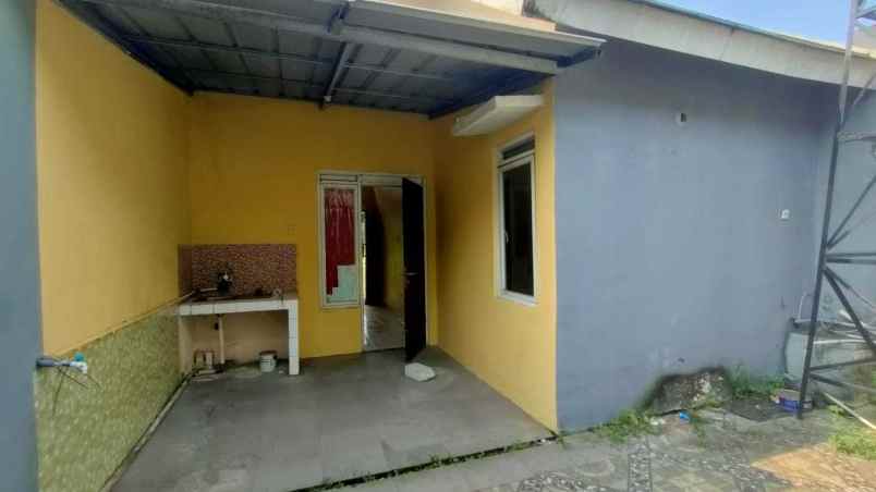 rumah perum mettland cileungsi