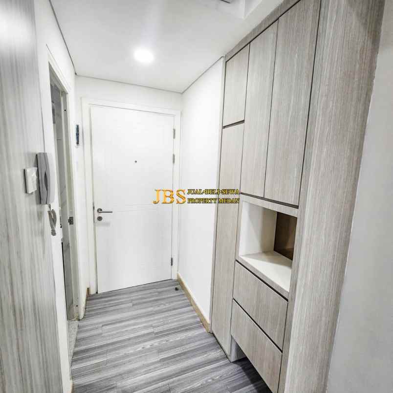 dijual apartemen podomoro city deli tower