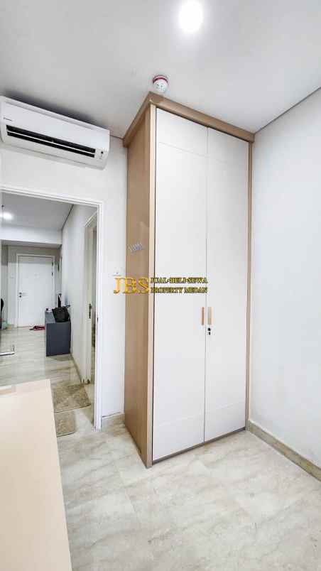 dijual apartemen podomoro city deli tower