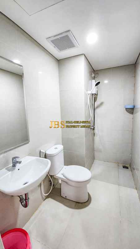 dijual apartemen podomoro city deli tower