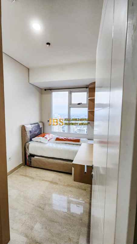 dijual apartemen podomoro city deli tower