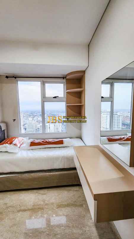 dijual apartemen podomoro city deli tower