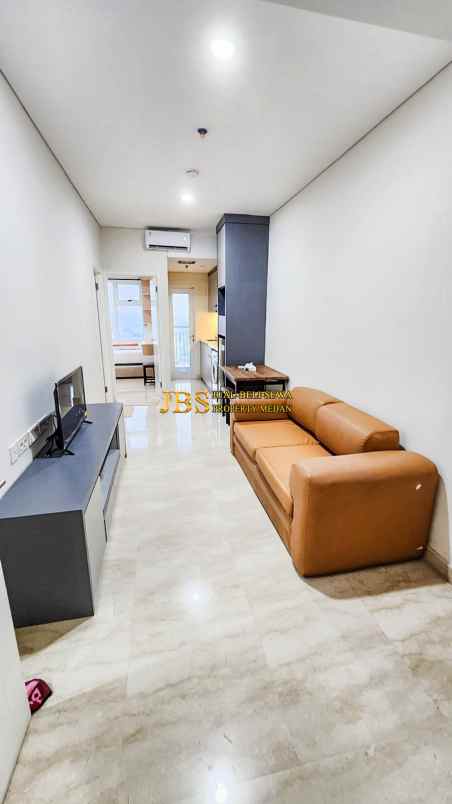 dijual apartemen podomoro city deli tower