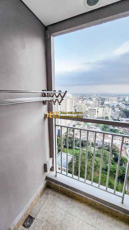 dijual apartemen podomoro city deli tower