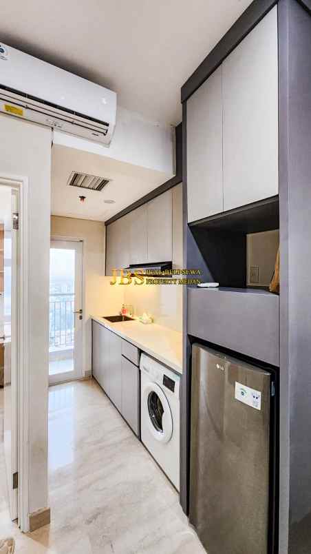 dijual apartemen podomoro city deli tower