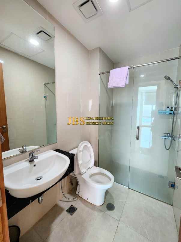 dijual apartemen the reiz condo