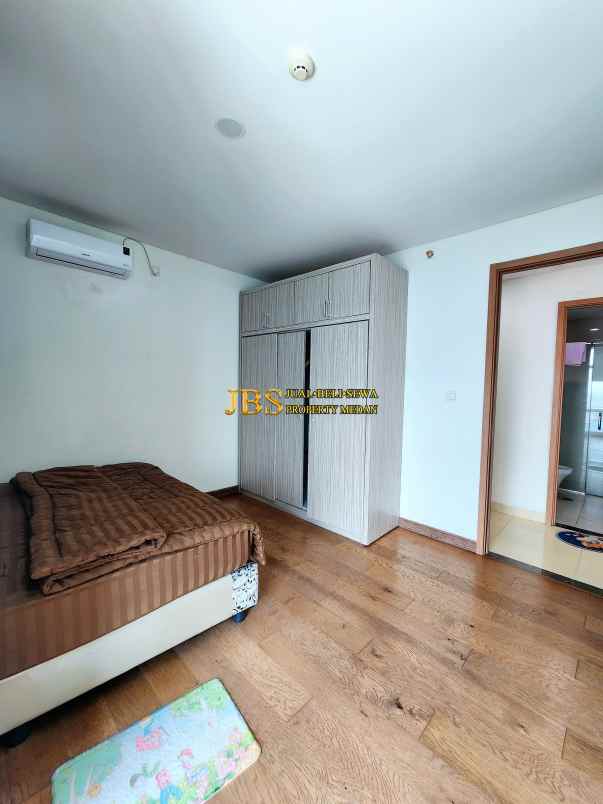 dijual apartemen the reiz condo