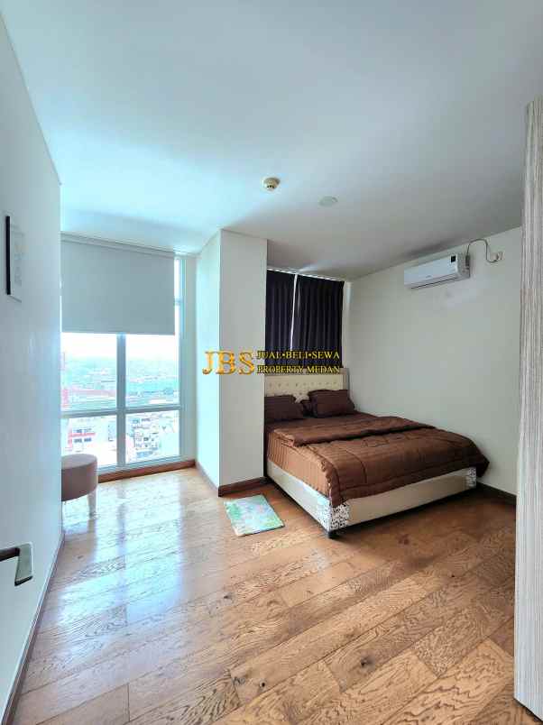 dijual apartemen the reiz condo