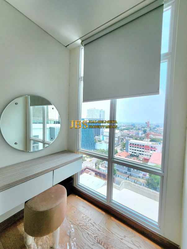 dijual apartemen the reiz condo