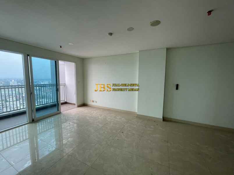 dijual condominium siap huni di the reiz condo medan