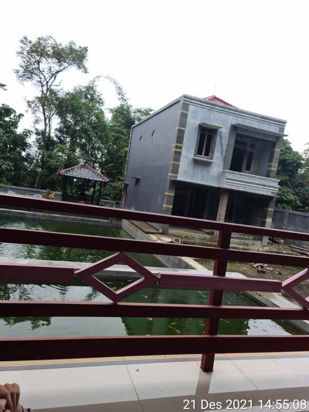 dijual rumah dan kolam ikan di kaduela kuningan