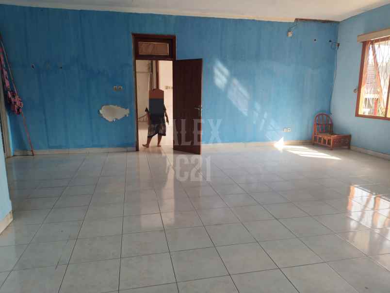 dijual rumah dan kostan bu duren sawit jak tim