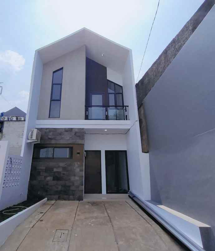 dijual rumah jalan raya aria putra