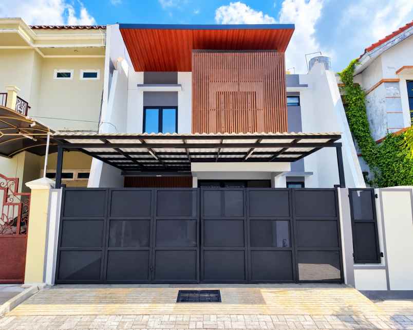 dijual rumah perumahan dharmahusada mas