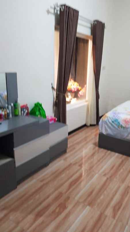 dijual rumah perumahan palm regency