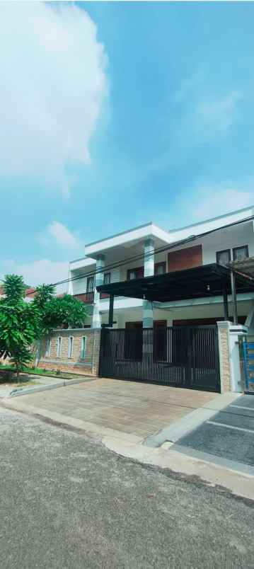 dijual rumah perumahan taman modern