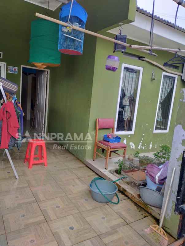 dijual rumah rawakalong