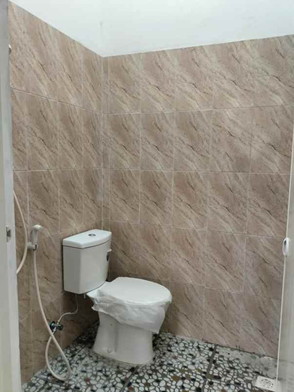 dijual rumah taman harapan baru