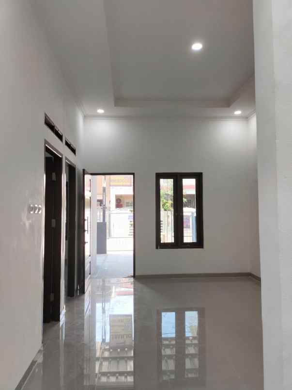 dijual rumah taman harapan baru