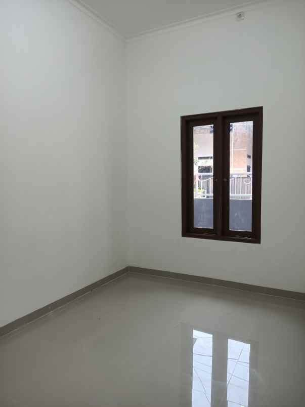 dijual rumah taman harapan baru kota