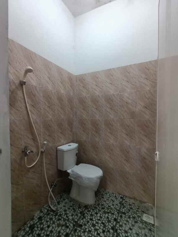 dijual rumah taman harapan baru kota