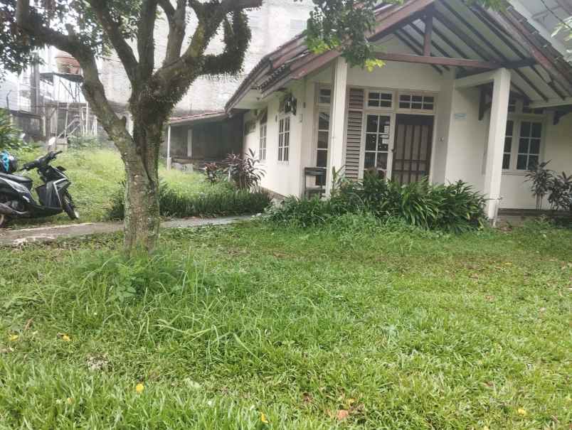 dijual tanah beserta bangunan kost an