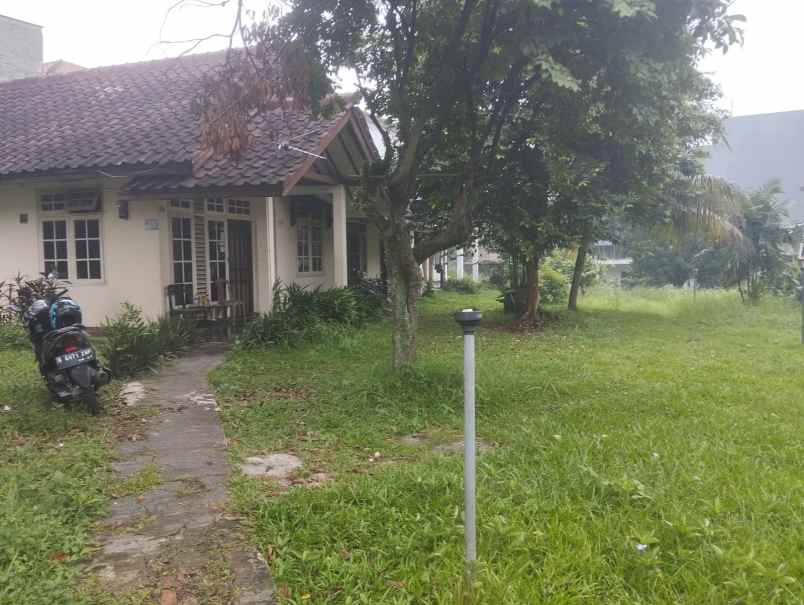 dijual tanah beserta bangunan kost an