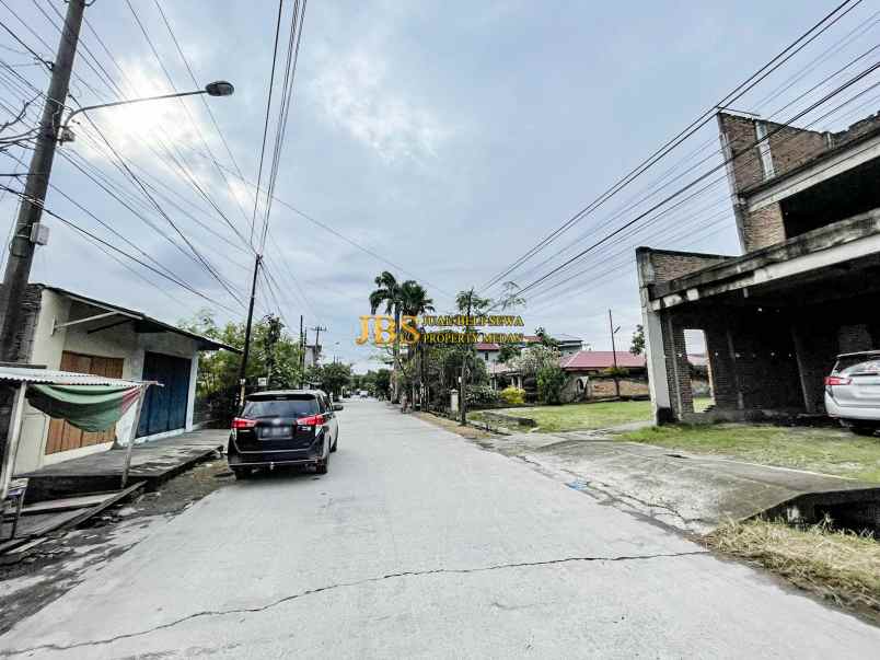 dijual tanah dan bangunan jalan amal luhur