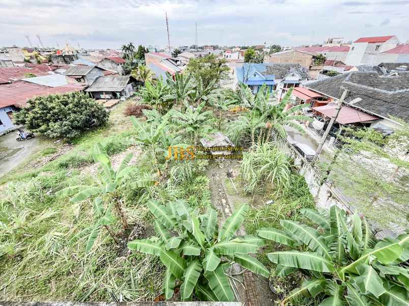 dijual tanah dan bangunan jalan amal luhur