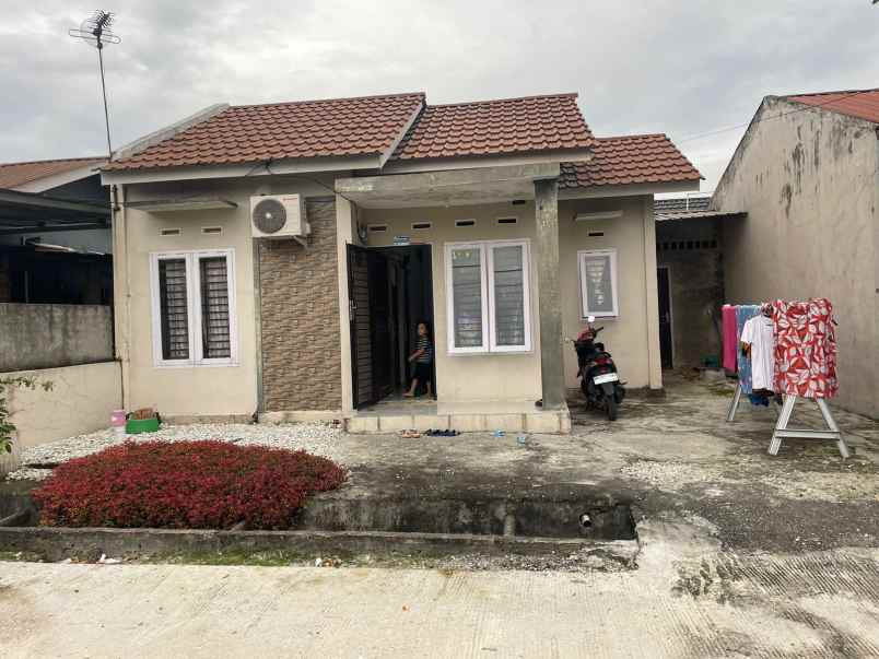 over rumah di garuda sakti km 4 5 perumahan gsb